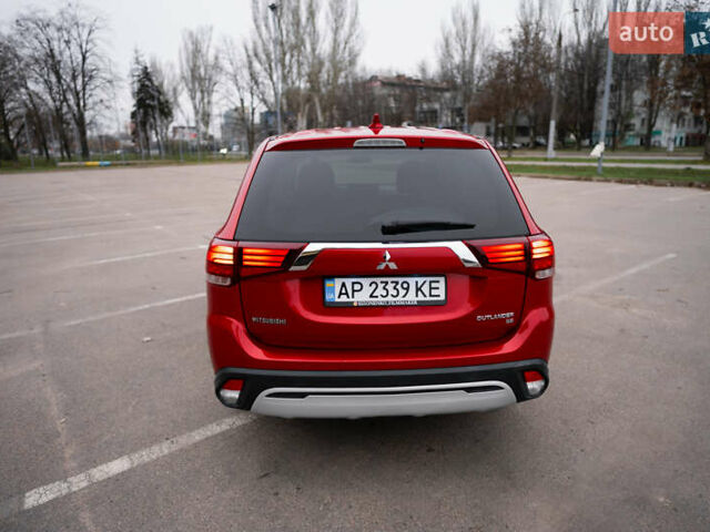 Красный Мицубиси Аутлендер, объемом двигателя 2.36 л и пробегом 145 тыс. км за 17000 $, фото 17 на Automoto.ua