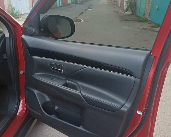 Червоний Міцубісі Аутлендер, об'ємом двигуна 2 л та пробігом 37 тис. км за 19500 $, фото 26 на Automoto.ua