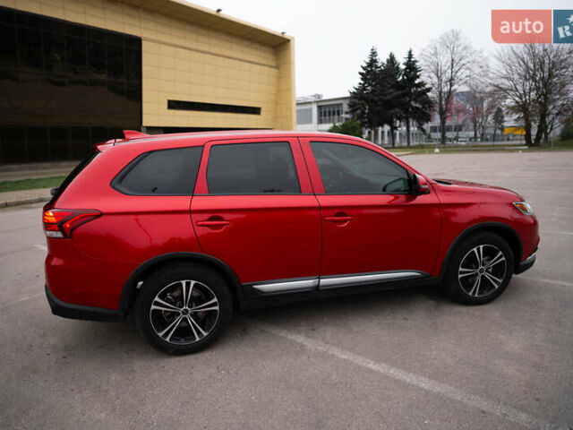 Красный Мицубиси Аутлендер, объемом двигателя 2.36 л и пробегом 145 тыс. км за 17000 $, фото 19 на Automoto.ua