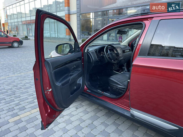 Красный Мицубиси Аутлендер, объемом двигателя 2.36 л и пробегом 100 тыс. км за 16500 $, фото 9 на Automoto.ua