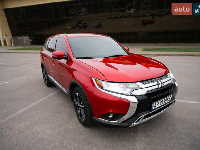 Красный Мицубиси Аутлендер, объемом двигателя 2.36 л и пробегом 145 тыс. км за 17000 $, фото 12 на Automoto.ua