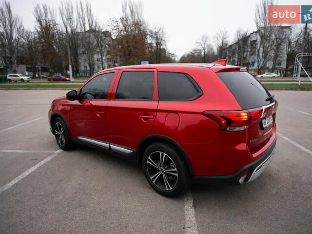 Красный Мицубиси Аутлендер, объемом двигателя 2.36 л и пробегом 145 тыс. км за 17000 $, фото 16 на Automoto.ua