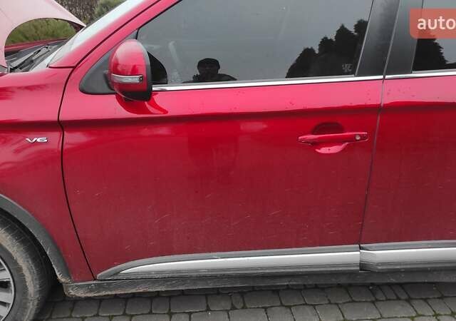 Червоний Міцубісі Аутлендер, об'ємом двигуна 3 л та пробігом 127 тис. км за 28500 $, фото 31 на Automoto.ua