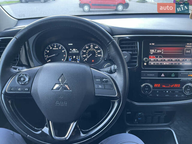 Красный Мицубиси Аутлендер, объемом двигателя 2.36 л и пробегом 100 тыс. км за 16500 $, фото 25 на Automoto.ua