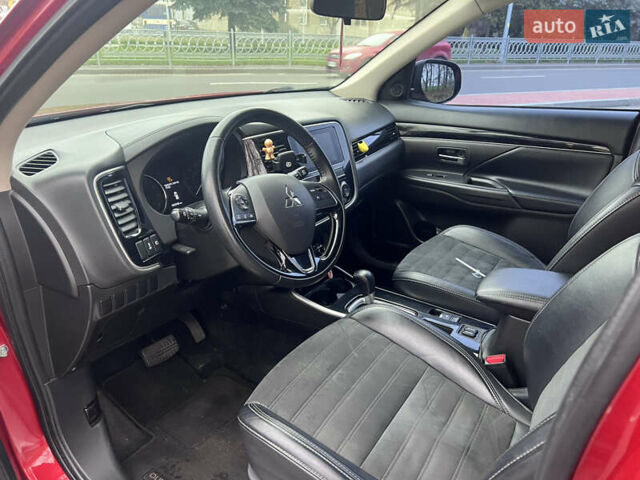 Червоний Міцубісі Аутлендер, об'ємом двигуна 2.36 л та пробігом 148 тис. км за 16500 $, фото 5 на Automoto.ua