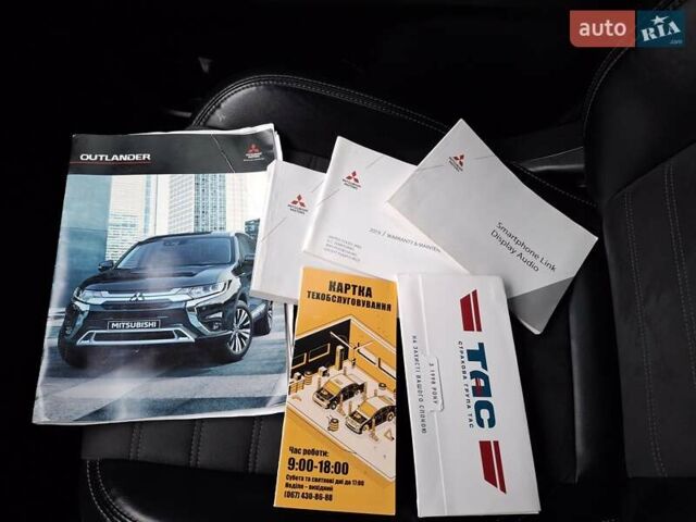 Красный Мицубиси Аутлендер, объемом двигателя 2.36 л и пробегом 110 тыс. км за 19000 $, фото 38 на Automoto.ua
