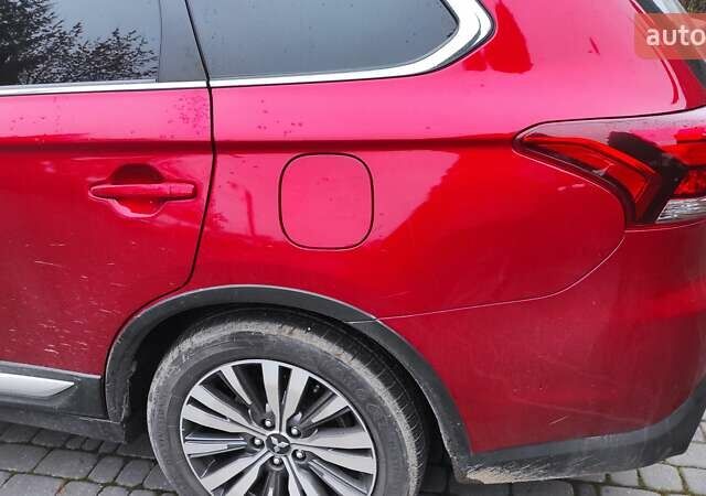 Червоний Міцубісі Аутлендер, об'ємом двигуна 3 л та пробігом 127 тис. км за 28500 $, фото 30 на Automoto.ua
