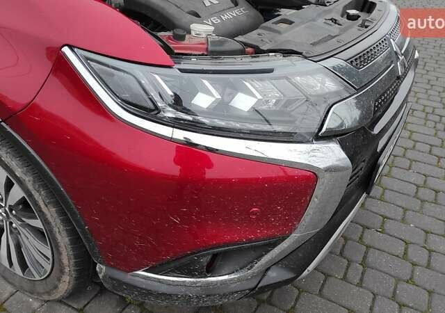 Червоний Міцубісі Аутлендер, об'ємом двигуна 3 л та пробігом 127 тис. км за 28500 $, фото 24 на Automoto.ua