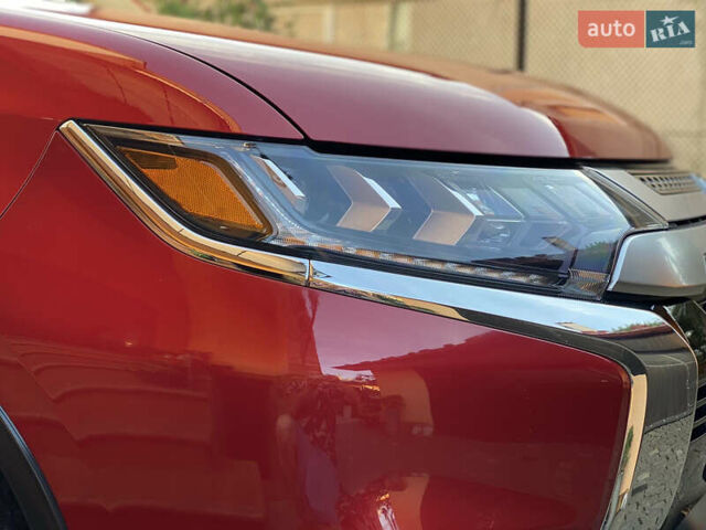 Красный Мицубиси Аутлендер, объемом двигателя 3 л и пробегом 106 тыс. км за 20700 $, фото 18 на Automoto.ua