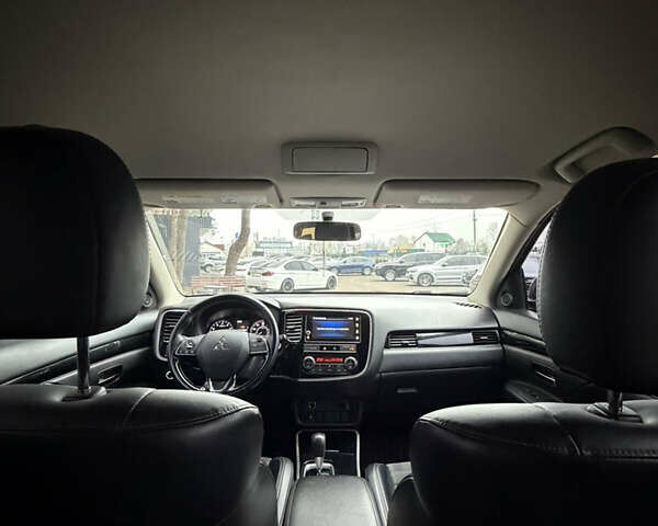 Красный Мицубиси Аутлендер, объемом двигателя 2.4 л и пробегом 197 тыс. км за 18700 $, фото 7 на Automoto.ua