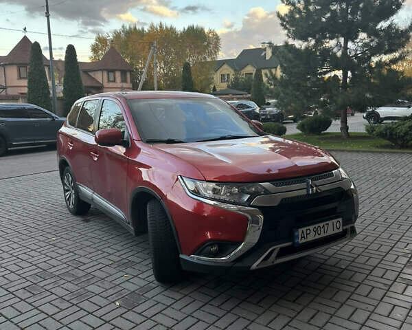 Червоний Міцубісі Аутлендер, об'ємом двигуна 2.36 л та пробігом 95 тис. км за 12500 $, фото 6 на Automoto.ua