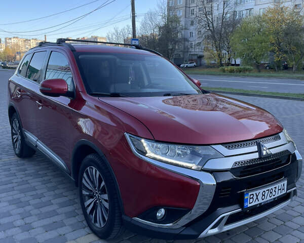 Красный Мицубиси Аутлендер, объемом двигателя 2.36 л и пробегом 100 тыс. км за 16500 $, фото 2 на Automoto.ua