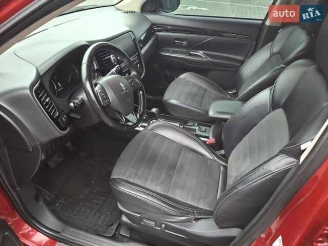 Красный Мицубиси Аутлендер, объемом двигателя 2.36 л и пробегом 110 тыс. км за 19000 $, фото 9 на Automoto.ua
