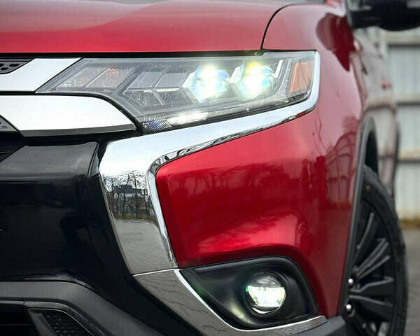 Червоний Міцубісі Аутлендер, об'ємом двигуна 3 л та пробігом 69 тис. км за 19000 $, фото 5 на Automoto.ua