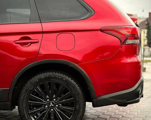 Червоний Міцубісі Аутлендер, об'ємом двигуна 3 л та пробігом 69 тис. км за 19000 $, фото 13 на Automoto.ua