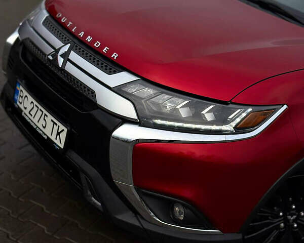 Червоний Міцубісі Аутлендер, об'ємом двигуна 3 л та пробігом 69 тис. км за 19000 $, фото 1 на Automoto.ua