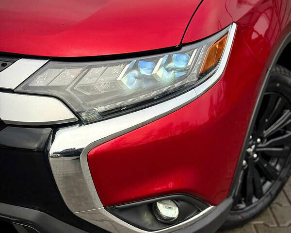 Червоний Міцубісі Аутлендер, об'ємом двигуна 3 л та пробігом 69 тис. км за 19000 $, фото 6 на Automoto.ua