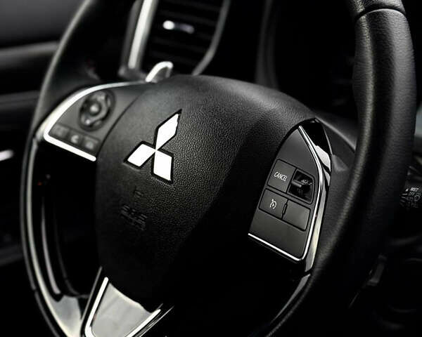 Червоний Міцубісі Аутлендер, об'ємом двигуна 3 л та пробігом 69 тис. км за 19000 $, фото 23 на Automoto.ua