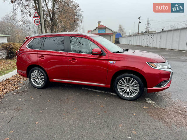 Красный Мицубиси Аутлендер, объемом двигателя 2.36 л и пробегом 65 тыс. км за 23800 $, фото 3 на Automoto.ua