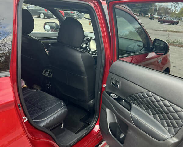 Красный Мицубиси Аутлендер, объемом двигателя 2.36 л и пробегом 94 тыс. км за 26000 $, фото 9 на Automoto.ua