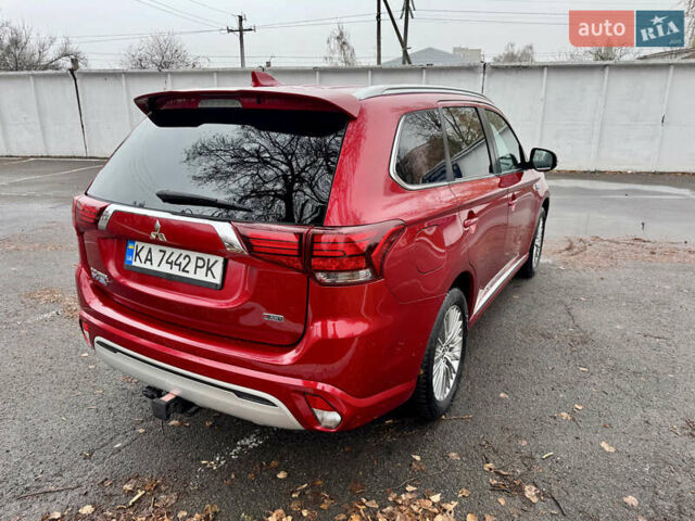 Красный Мицубиси Аутлендер, объемом двигателя 2.36 л и пробегом 65 тыс. км за 23800 $, фото 5 на Automoto.ua
