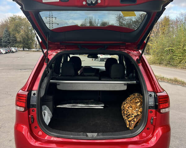 Красный Мицубиси Аутлендер, объемом двигателя 2.36 л и пробегом 94 тыс. км за 26000 $, фото 5 на Automoto.ua