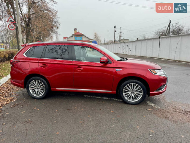 Красный Мицубиси Аутлендер, объемом двигателя 2.36 л и пробегом 65 тыс. км за 23800 $, фото 32 на Automoto.ua