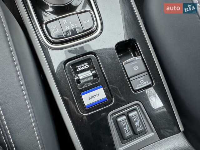 Красный Мицубиси Аутлендер, объемом двигателя 2.36 л и пробегом 65 тыс. км за 23800 $, фото 22 на Automoto.ua