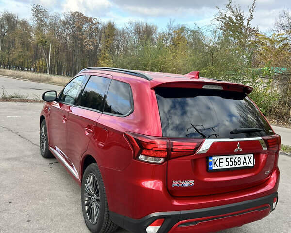 Красный Мицубиси Аутлендер, объемом двигателя 2.36 л и пробегом 94 тыс. км за 26000 $, фото 2 на Automoto.ua