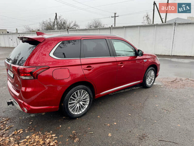 Красный Мицубиси Аутлендер, объемом двигателя 2.36 л и пробегом 65 тыс. км за 23800 $, фото 35 на Automoto.ua
