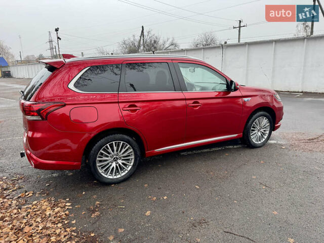 Красный Мицубиси Аутлендер, объемом двигателя 2.36 л и пробегом 65 тыс. км за 23800 $, фото 4 на Automoto.ua