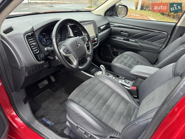 Красный Мицубиси Аутлендер, объемом двигателя 2.36 л и пробегом 65 тыс. км за 23800 $, фото 14 на Automoto.ua
