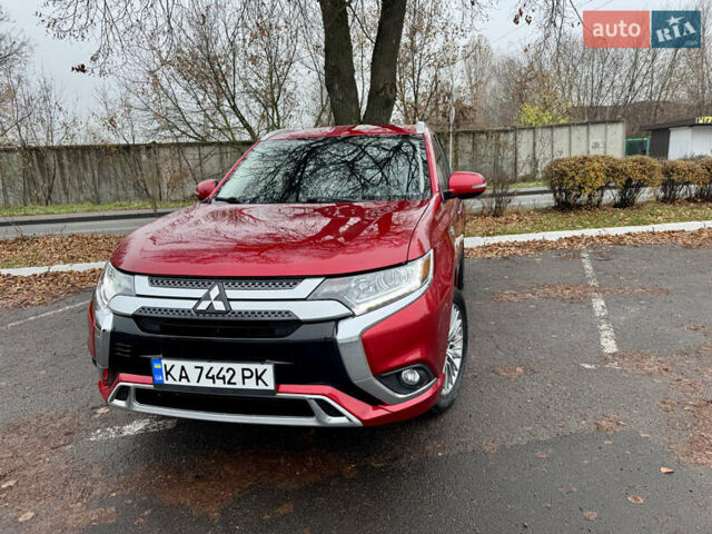 Красный Мицубиси Аутлендер, объемом двигателя 2.36 л и пробегом 65 тыс. км за 23800 $, фото 28 на Automoto.ua