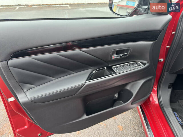 Красный Мицубиси Аутлендер, объемом двигателя 2.36 л и пробегом 65 тыс. км за 23800 $, фото 15 на Automoto.ua