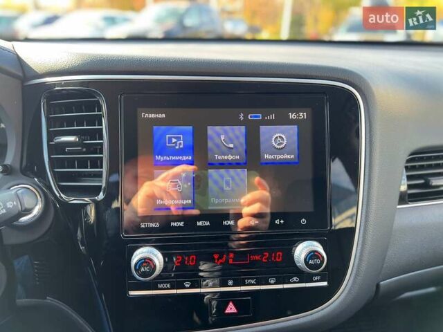 Красный Мицубиси Аутлендер, объемом двигателя 2.36 л и пробегом 40 тыс. км за 24400 $, фото 20 на Automoto.ua
