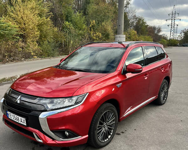 Красный Мицубиси Аутлендер, объемом двигателя 2.36 л и пробегом 94 тыс. км за 26000 $, фото 7 на Automoto.ua