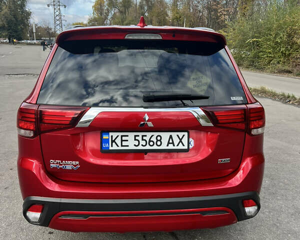 Красный Мицубиси Аутлендер, объемом двигателя 2.36 л и пробегом 94 тыс. км за 26000 $, фото 3 на Automoto.ua