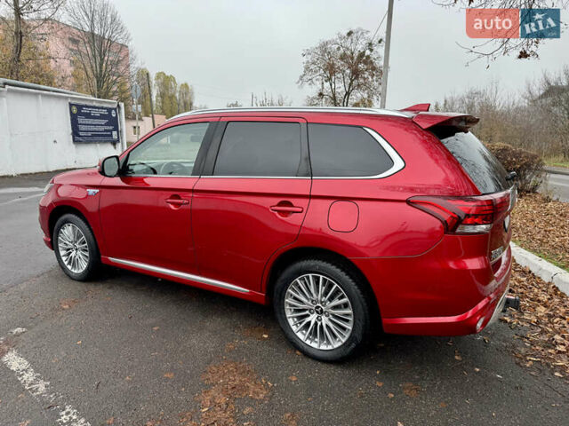 Красный Мицубиси Аутлендер, объемом двигателя 2.36 л и пробегом 65 тыс. км за 23800 $, фото 7 на Automoto.ua
