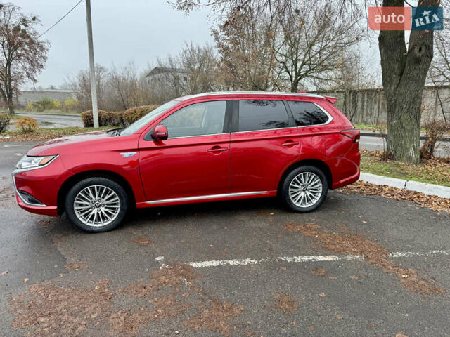 Красный Мицубиси Аутлендер, объемом двигателя 2.36 л и пробегом 65 тыс. км за 23800 $, фото 29 на Automoto.ua