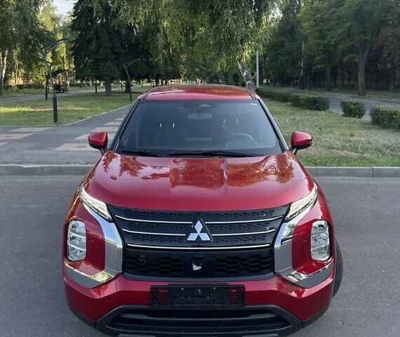 Красный Мицубиси Аутлендер, объемом двигателя 2.5 л и пробегом 44 тыс. км за 22000 $, фото 1 на Automoto.ua