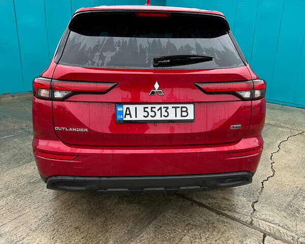 Красный Мицубиси Аутлендер, объемом двигателя 2.49 л и пробегом 44 тыс. км за 25000 $, фото 3 на Automoto.ua