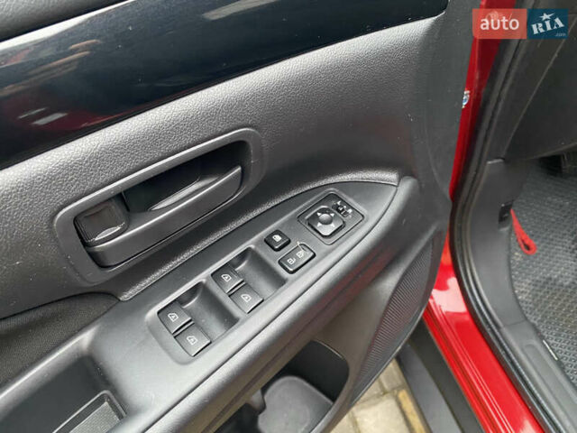 Красный Мицубиси Аутлендер, объемом двигателя 2 л и пробегом 40 тыс. км за 23500 $, фото 19 на Automoto.ua