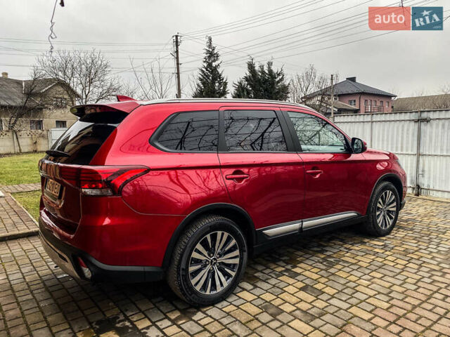 Красный Мицубиси Аутлендер, объемом двигателя 2 л и пробегом 40 тыс. км за 23500 $, фото 11 на Automoto.ua