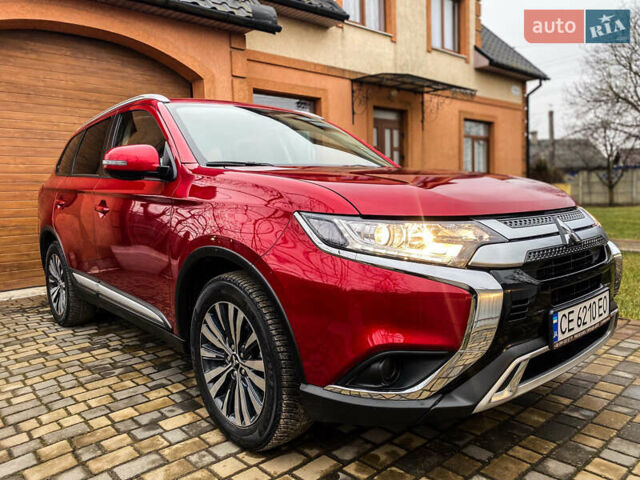 Красный Мицубиси Аутлендер, объемом двигателя 2 л и пробегом 40 тыс. км за 23500 $, фото 38 на Automoto.ua