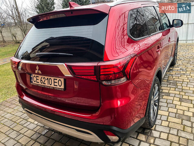 Красный Мицубиси Аутлендер, объемом двигателя 2 л и пробегом 40 тыс. км за 23500 $, фото 12 на Automoto.ua