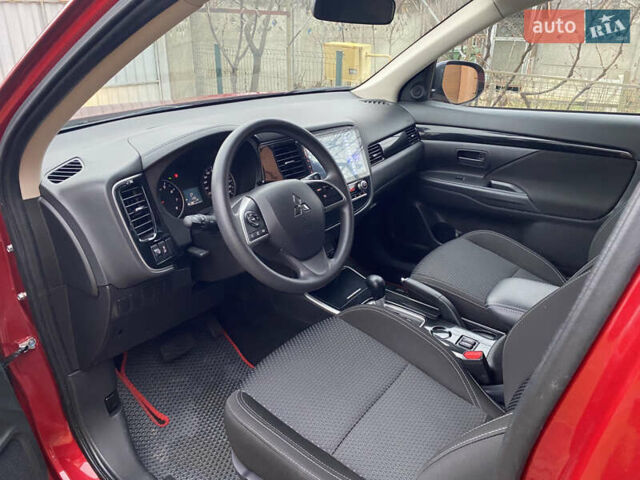 Красный Мицубиси Аутлендер, объемом двигателя 2 л и пробегом 40 тыс. км за 23500 $, фото 20 на Automoto.ua
