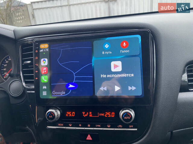 Красный Мицубиси Аутлендер, объемом двигателя 2 л и пробегом 40 тыс. км за 23500 $, фото 32 на Automoto.ua