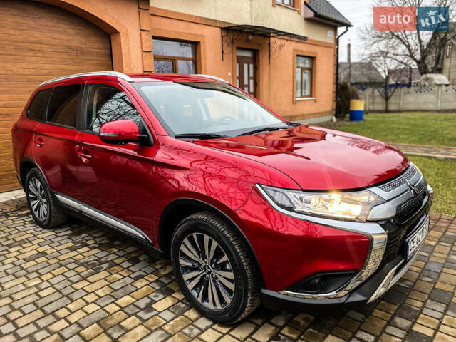 Красный Мицубиси Аутлендер, объемом двигателя 2 л и пробегом 40 тыс. км за 23500 $, фото 39 на Automoto.ua