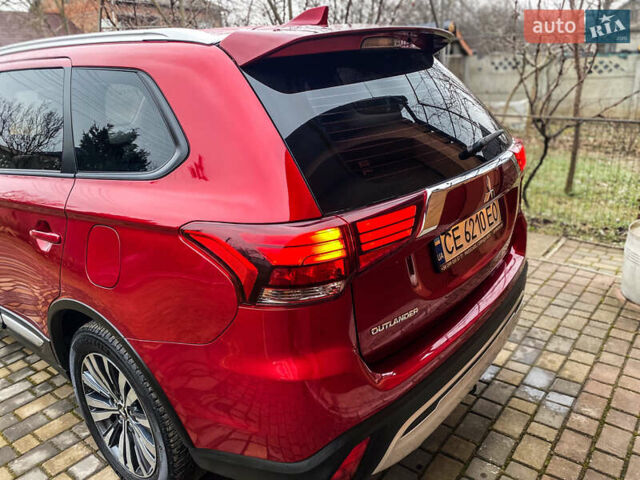 Красный Мицубиси Аутлендер, объемом двигателя 2 л и пробегом 40 тыс. км за 23500 $, фото 41 на Automoto.ua