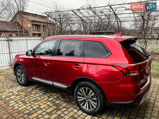 Красный Мицубиси Аутлендер, объемом двигателя 2 л и пробегом 40 тыс. км за 23500 $, фото 14 на Automoto.ua